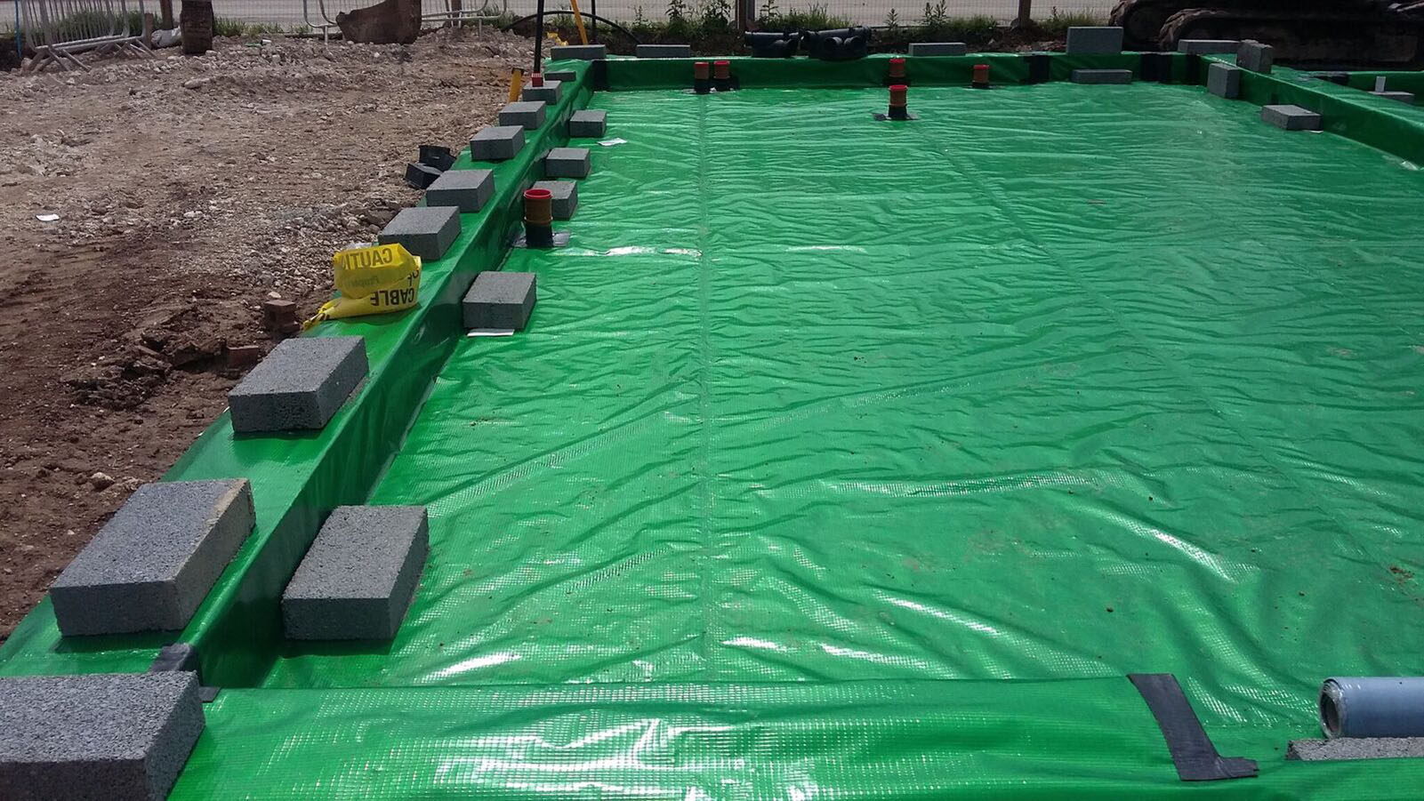 Gas Resistant Membranes for Building Footprints: Foil-Encapsulated vs Non-Foil Systems. Featured Image